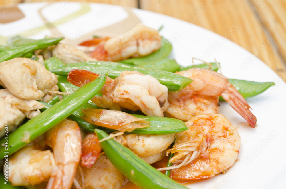 Close-up Fried shrimp, pork and sweet peas Close-up Fried shrimp, pork and sweet peas