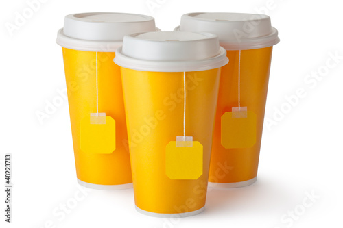 Three take-out teacups with teabags