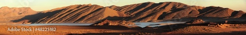 Panoramic of Sand dunes over an Oasis in Morocco