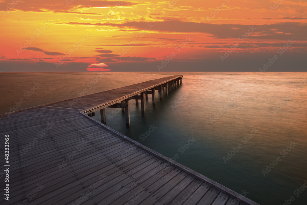 sun rise sky and old wood bridge pier
