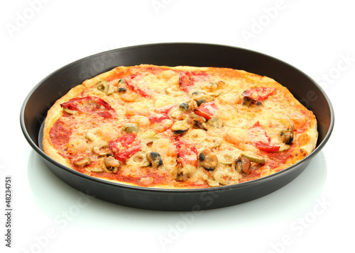 Delicious pizza with seafood in the frying pan isolated on