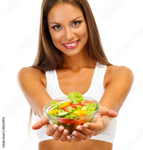 beautiful young woman with salad, isolated on white