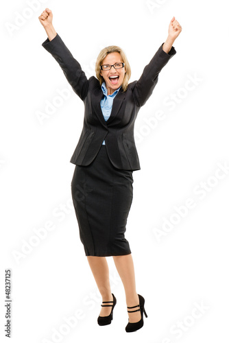 Happy mature business woman arms up isolated on white background