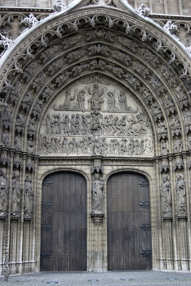 Bronze door entry to famous Vrouwekathedraal - Cathedral of our