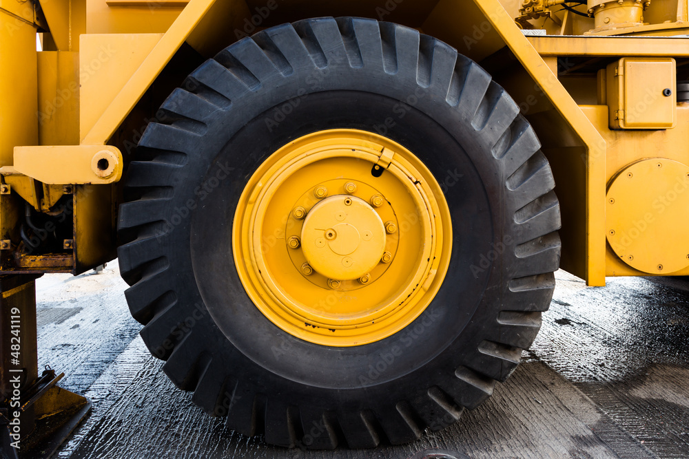Close up to big tractor tire and wheel Close up to big tractor tire and wheel