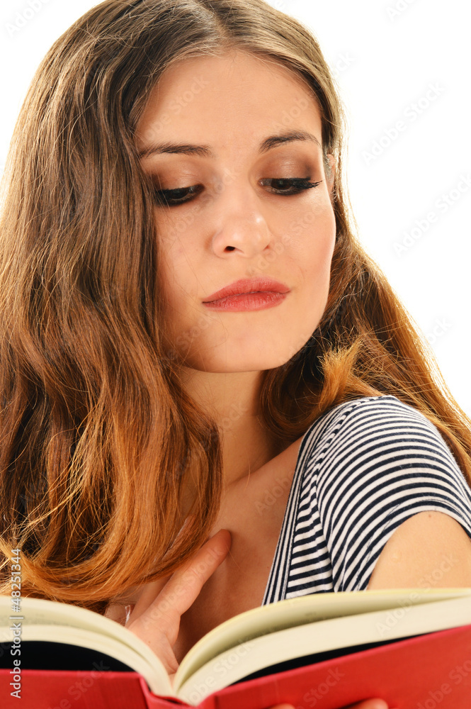 Young woman reading a book isolated on white Young woman reading a book isolated on white