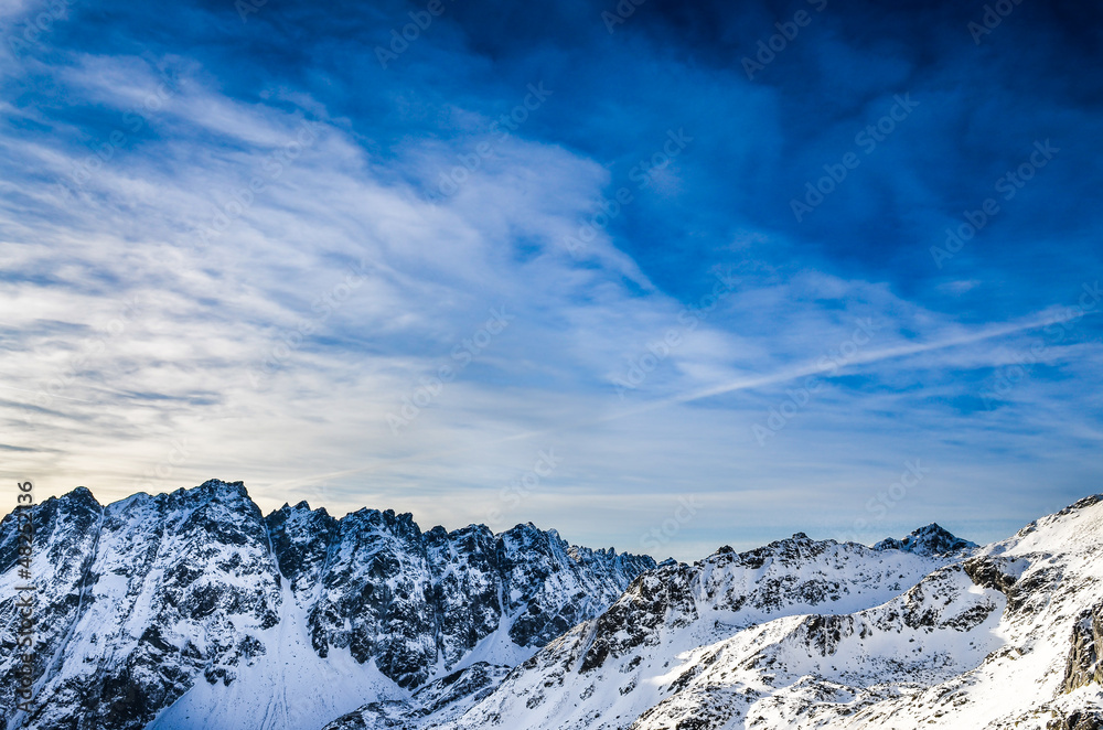 Fototapeta premium Winter High Tatras mountains landscape with blue cloudy sky