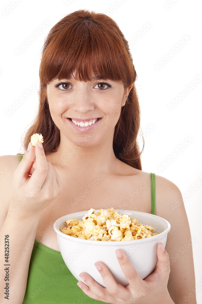 Beautiful woman eating popcorn Beautiful woman eating popcorn