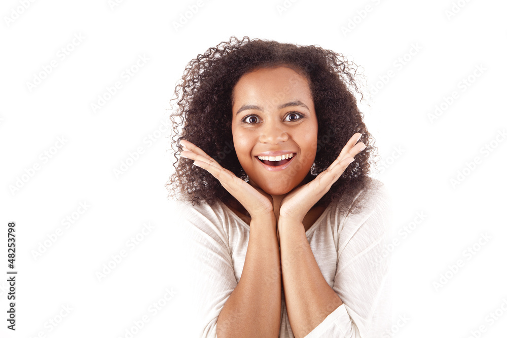 Surprised young african woman with hands over her mouth Surprised young african woman with hands over her mouth