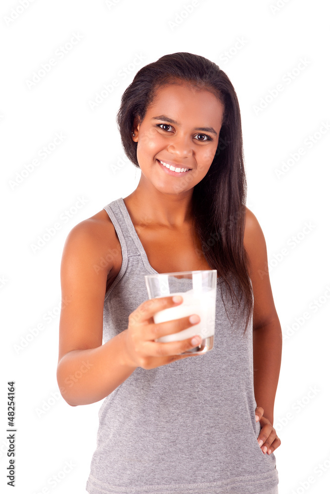 Happy african young female holding a glass of fresh milk Happy african young female holding a glass of fresh milk