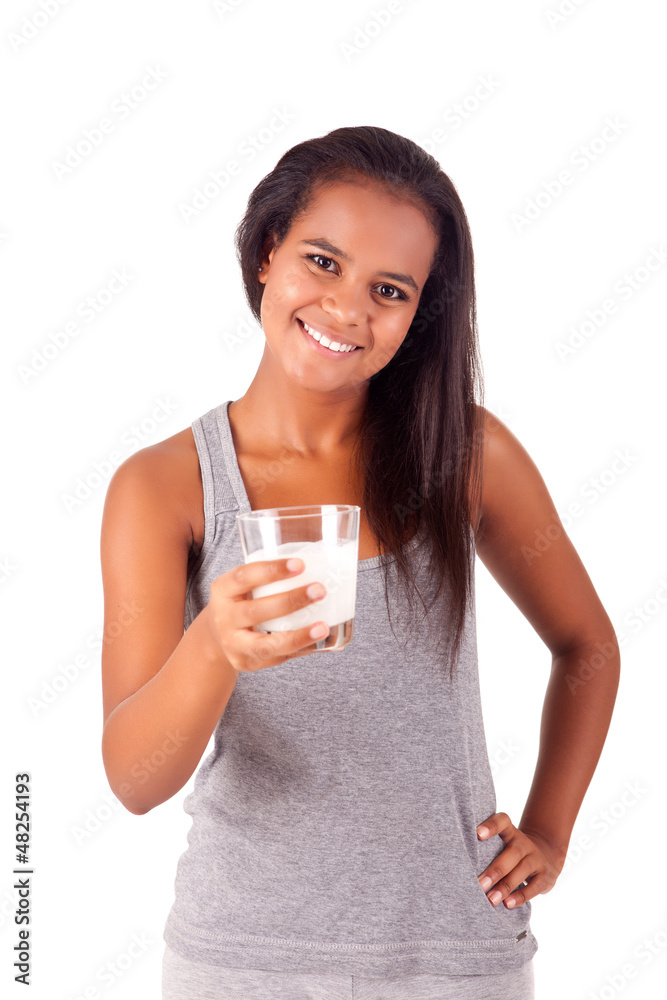 Happy african young female holding a glass of fresh milk Happy african young female holding a glass of fresh milk