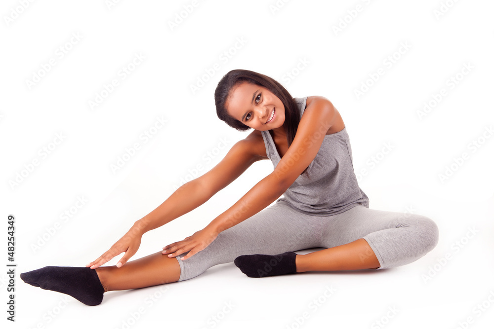 Pretty young african woman doing exercise Pretty young african woman doing exercise