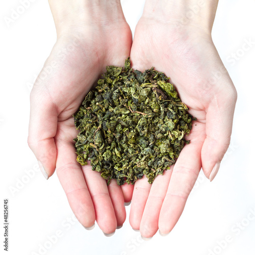 Нands holding green tea