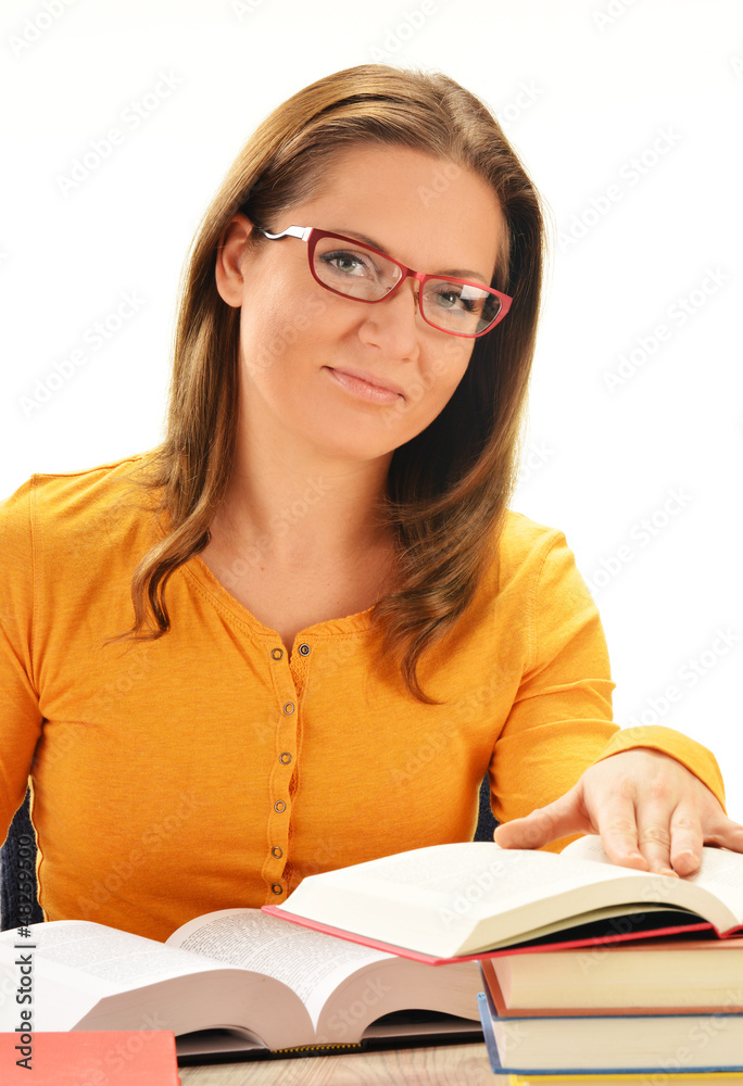 Young woman reading a book. Female student learning Young woman reading a book. Female student learning