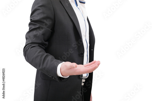 An empty hand of a businessman in black suit