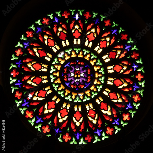Colourful round window of stained glass