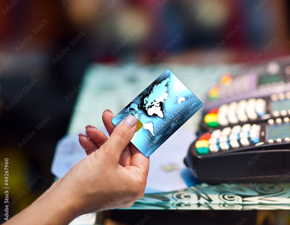 woman hand holding credit card woman hand holding credit card