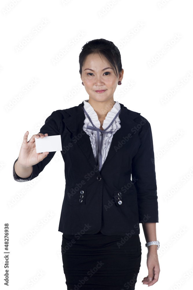 Business woman in black suit handing a blank business card Business woman in black suit handing a blank business card