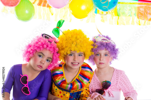Children happy birthday party with clown wigs