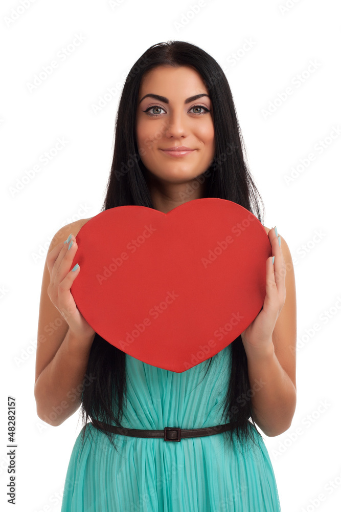 Woman holding Valentines Day heart sign Woman holding Valentines Day heart sign