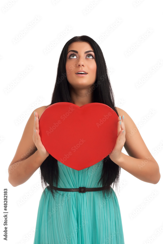 Woman holding Valentines Day heart sign Woman holding Valentines Day heart sign
