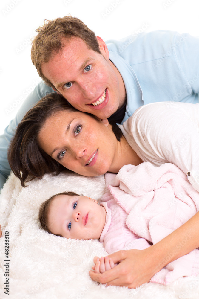 Baby girl mother and father family happy lying together Baby girl mother and father family happy lying together