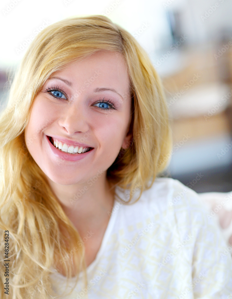 Portait of beautiful blond smiling woman Portait of beautiful blond smiling woman