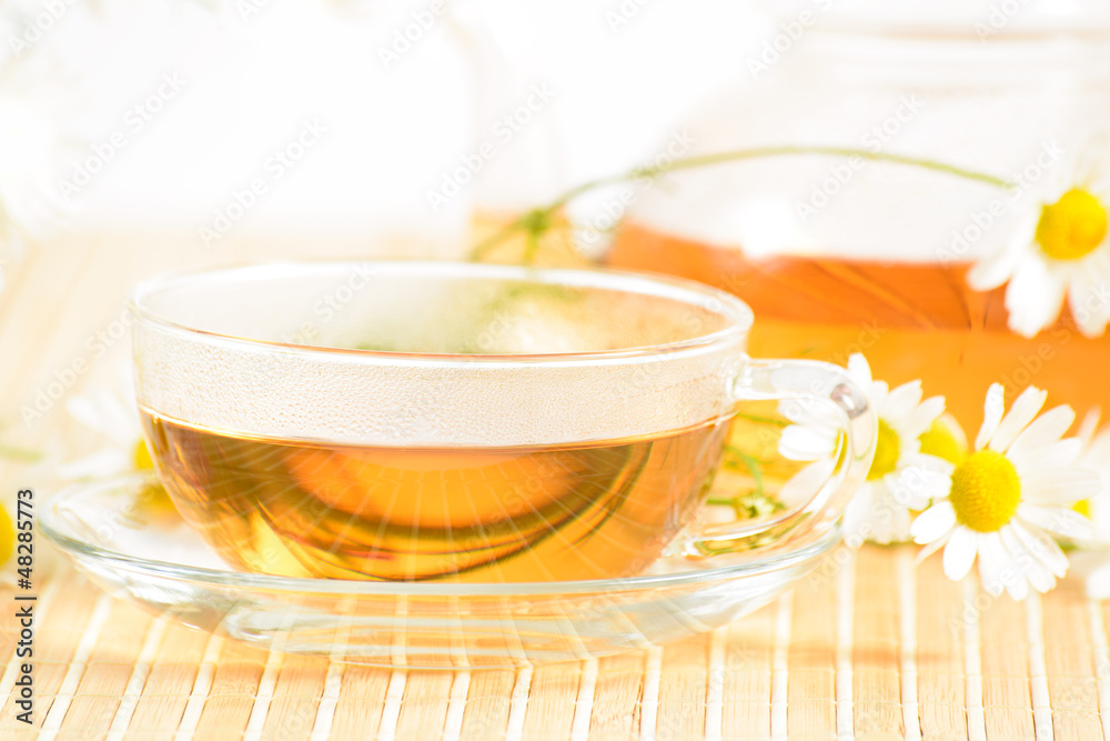 teacup with herbal chamomile tea teacup with herbal chamomile tea