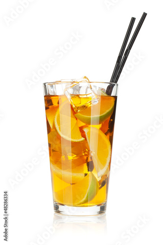 Glass of ice tea with lemon and lime