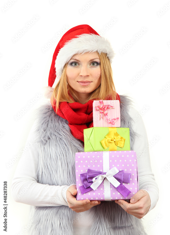 Attractive young woman holding Christmas gifts, isolated Attractive young woman holding Christmas gifts, isolated