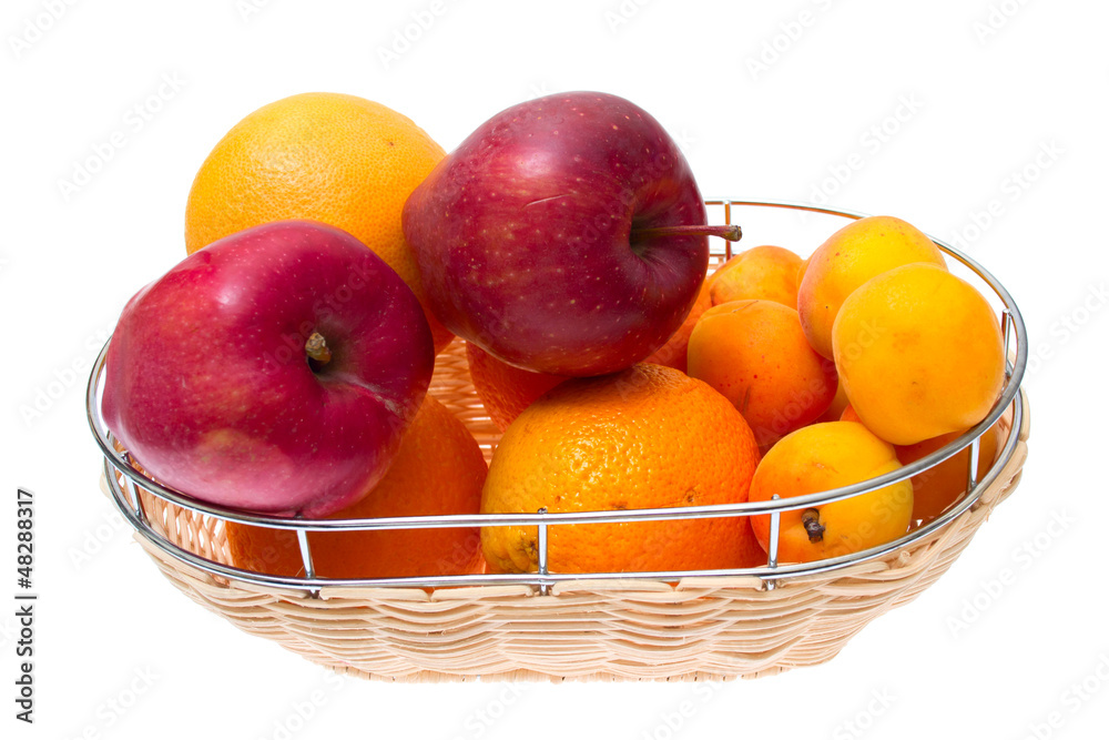Apple, orange, apricot on bowl isolated on white background Apple, orange, apricot on bowl isolated on white background