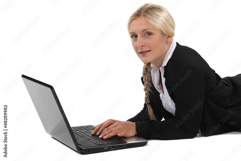 Businesswoman laid in front of computer Businesswoman laid in front of computer