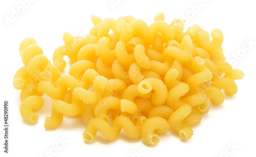 Heap of cellentani pasta isolated on white background
