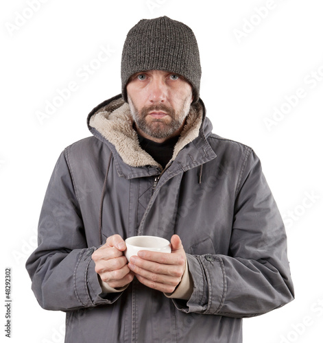 adult man holding cup