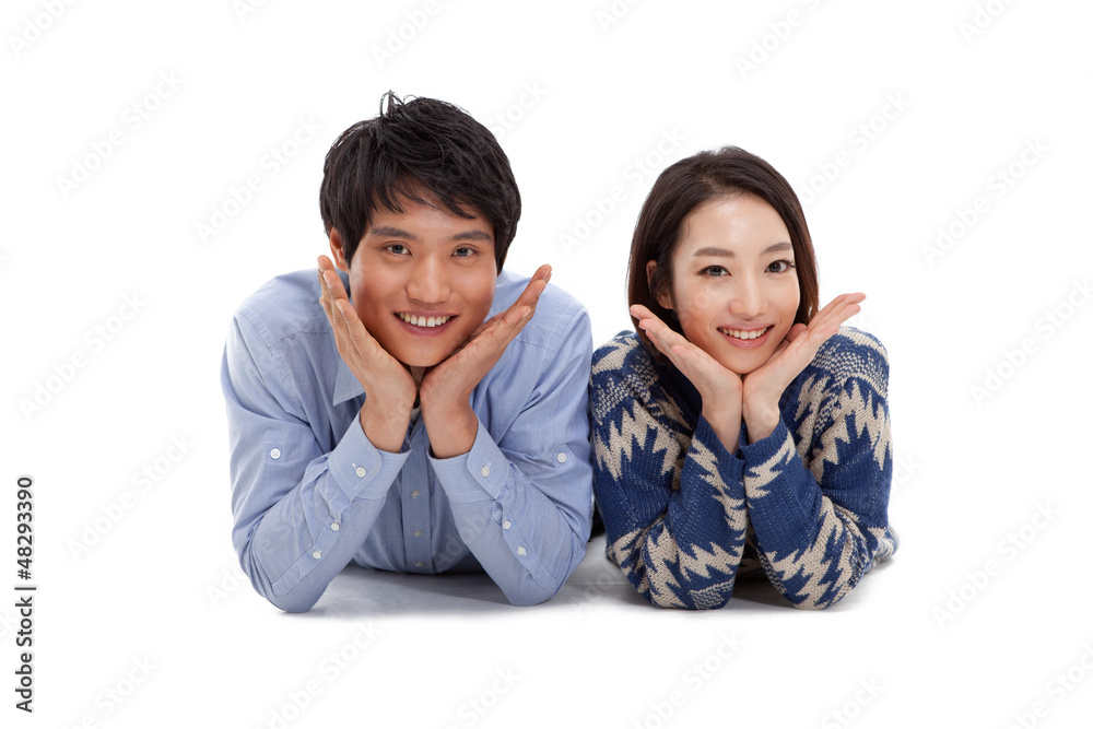 Young Asian couple isolated on white background. Young Asian couple isolated on white background.
