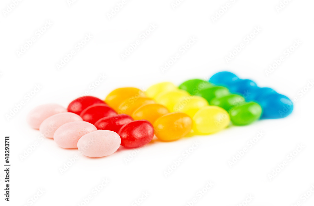 Multi colored candy on white background