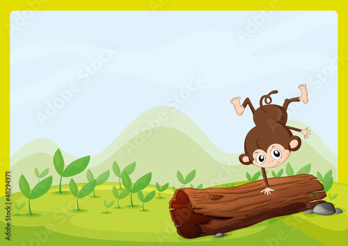 A monkey dancing on a dry trunk