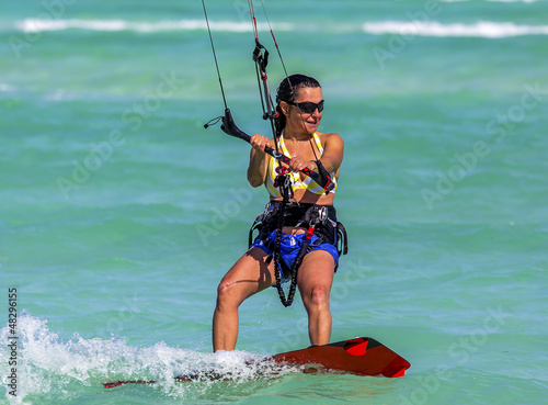 Kite-surfing girl © Alexander Kolomietz