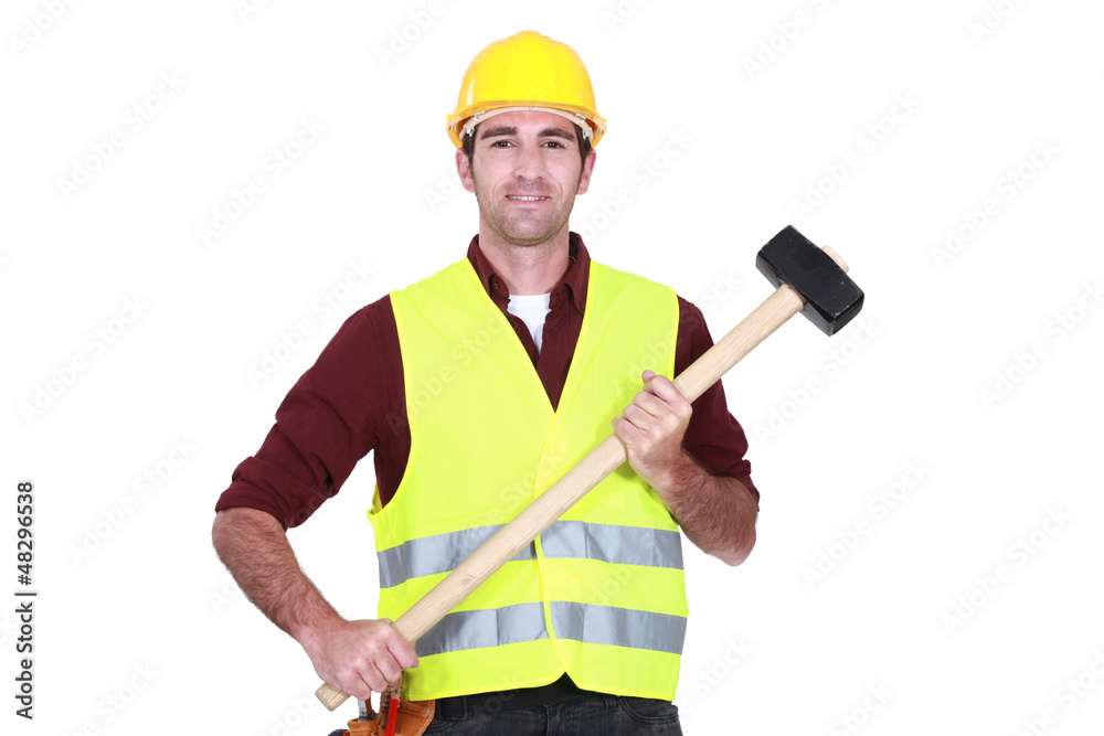 Labourer holding a mallet Labourer holding a mallet