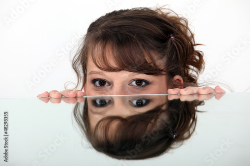Fotografia Mirror image of a woman