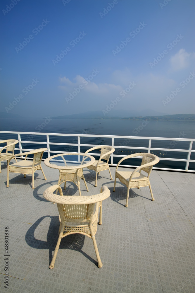 cany chair on ship's deck