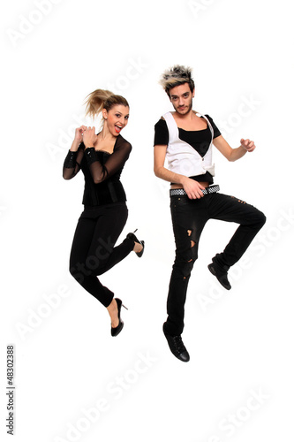 Young couple with style jumping