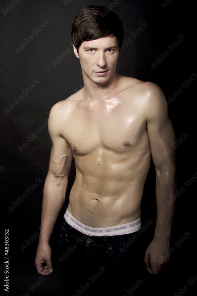 Studio shot of strong fitness handsome sports man thinking, look Studio shot of strong fitness handsome sports man thinking, look