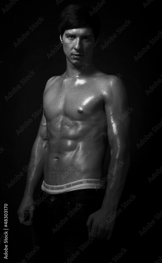 Naked sports man looking at the camera Naked sports man looking at the camera