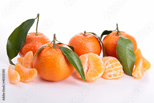 Ripe sweet tangerine isolated on white