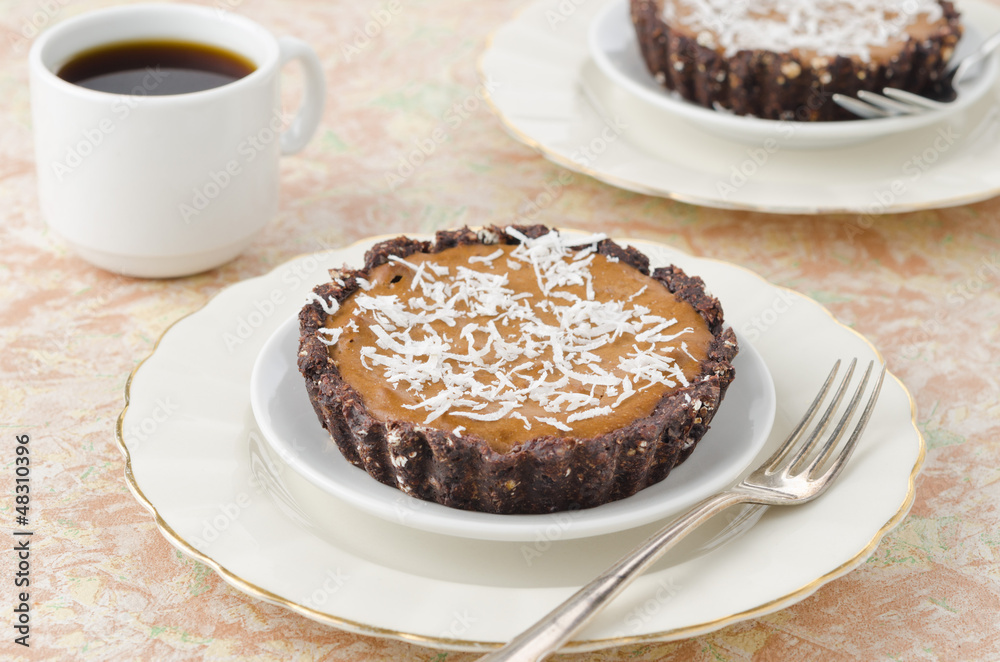 Chocolate tarts with cream and coffee horizontal Chocolate tarts with cream and coffee horizontal