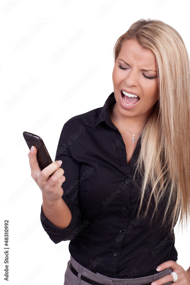 Woman looking at her mobile in frustration