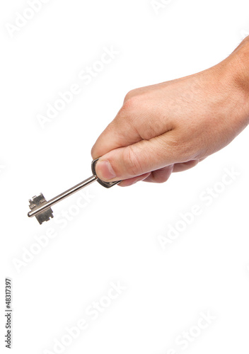 Male hand holding a key to the house © Sergii Figurnyi