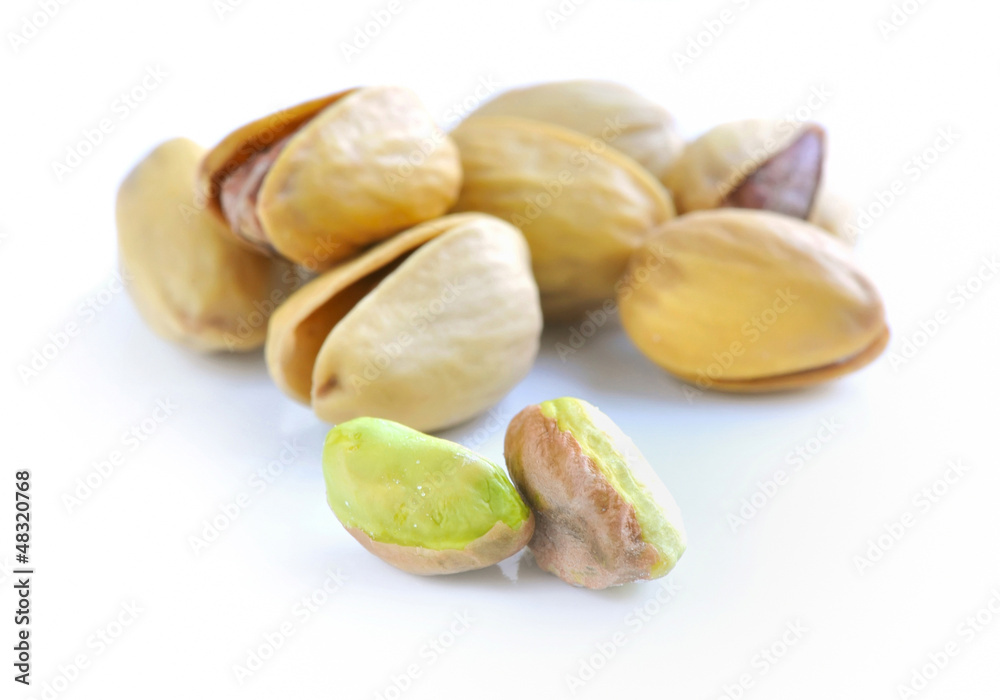 Fototapeta premium Pistachio nuts on white background