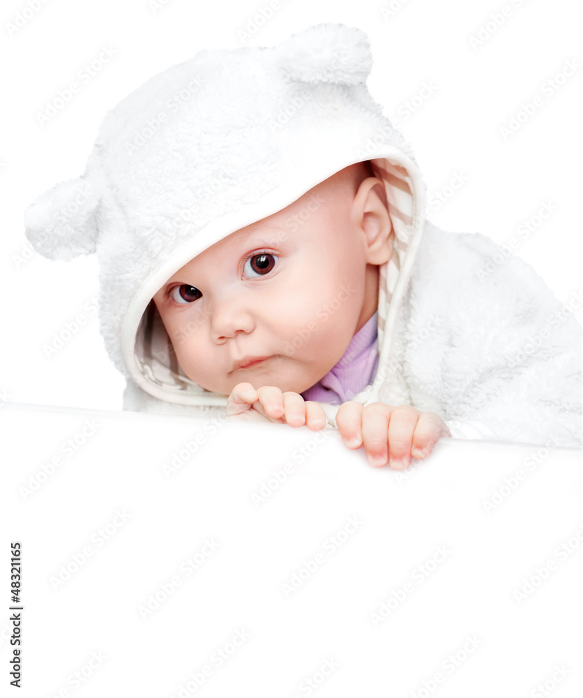 Baby in white bear costume with empty white board Baby in white bear costume with empty white board